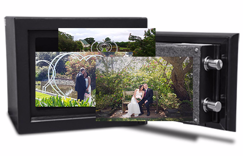 Black DS-0 safe with a photo album with two open pages showing a couple in a park.